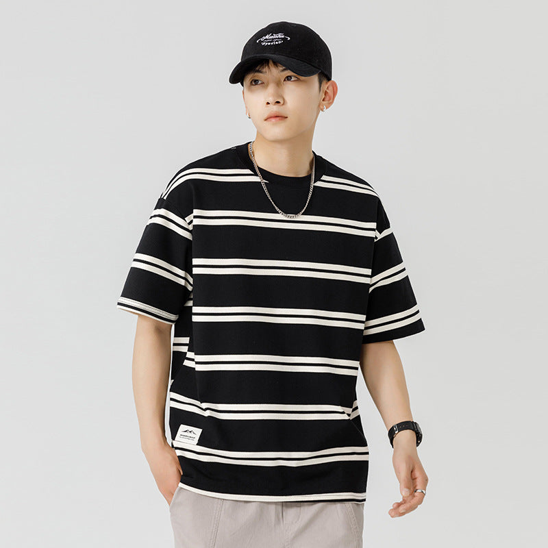 Black and white striped short sleeved T-shirt for men in spring and summer
