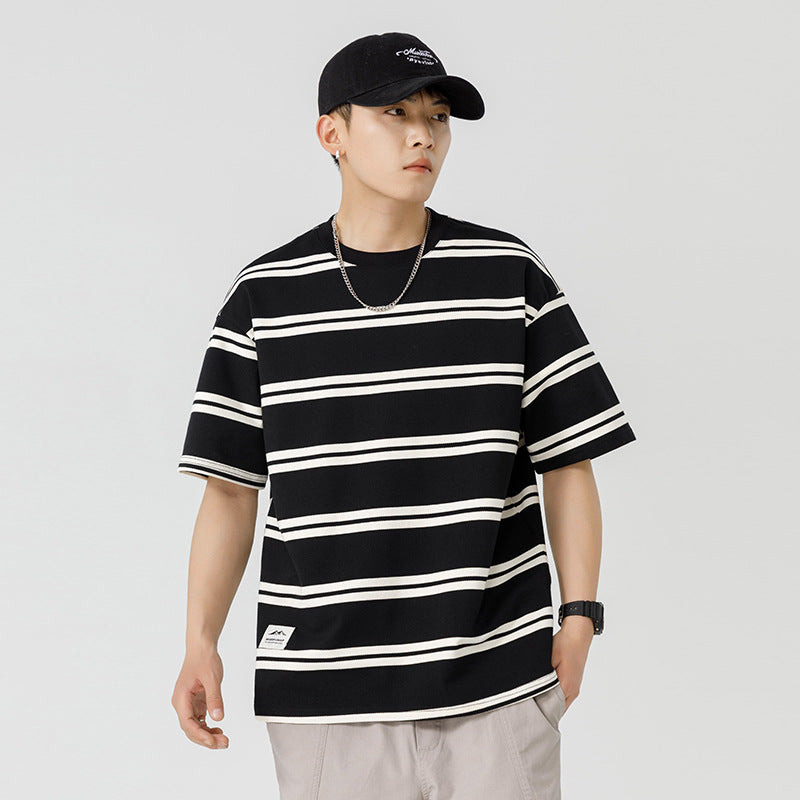 Black and white striped short sleeved T-shirt for men in spring and summer