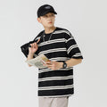 Black and white striped short sleeved T-shirt for men in spring and summer